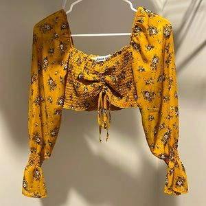 Casual and elegant, yellow color with flower design.